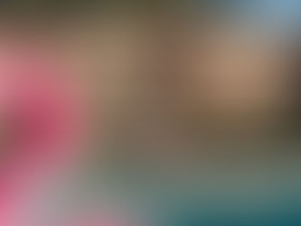 A girl on the edge of the pool getting an IV NAD drip in LA