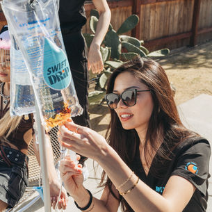 An IV nurse injecting Vitamin C in an IV bag