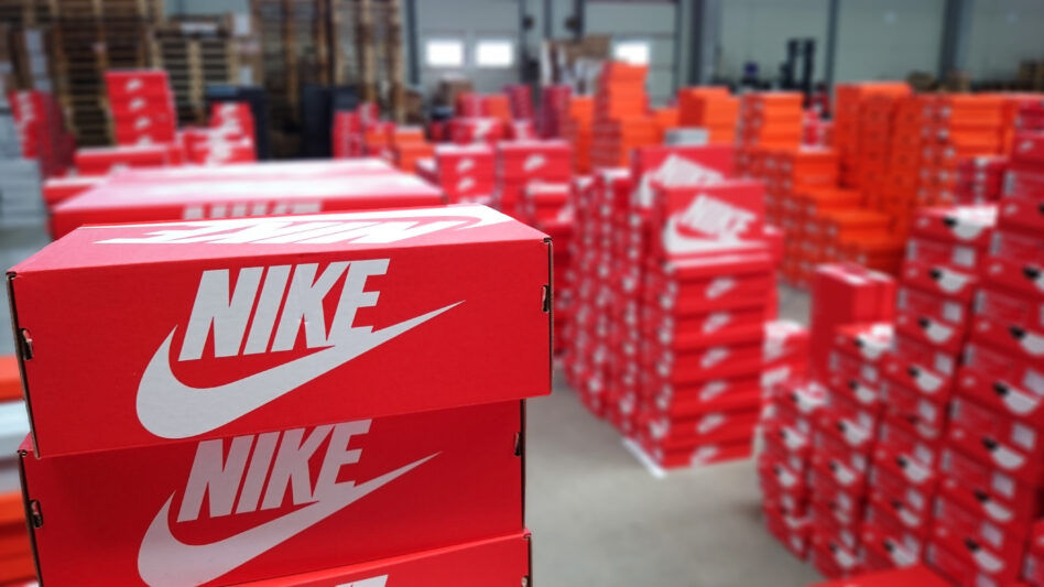 Warehouse with stacks of Nike shoe boxes