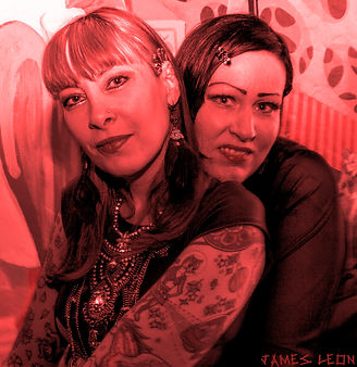 Neg RedBlack Serena & Angie sitting.jpg