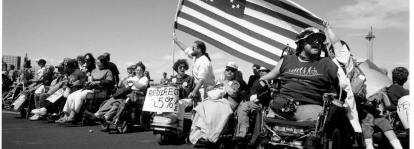 walk capital hill march photo (black and white picture of people in wheelchairs holding signs)