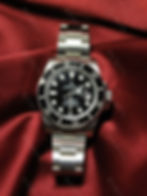Наручные дайверские часы Rolex Submariner с черным циферблатом на стальном браслете Oyster и красном шелке