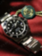 Rolex Submariner 126610LN Black — премиальная реплика часов, макросъемка черного циферблата с зеленым тегом