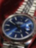 Наручные часы Rolex Datejust 41 Синий Мотив с рифленым безелем и прямоугольными индексами крупным планом