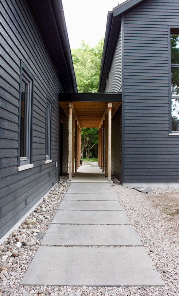 Breezeway to the main entrance - walls still a bit dusty from the landscaping work!