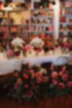Reception table centrepiece arrangements for full wedding package by Flowers By Annette