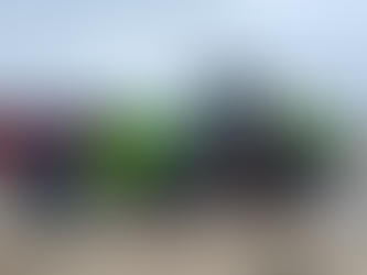 LiuGong 848TE eldriven hjullastare i sidovy på gårdsplan hos Stig Machine.