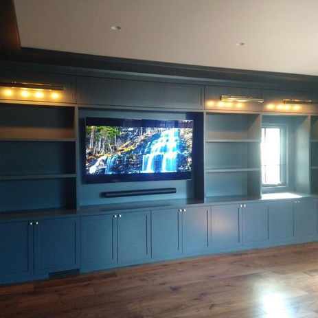 and drawers. Custom cabinets built from scratch. Custom range hood
