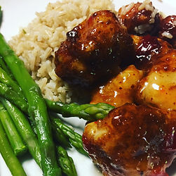 baked orange chicken with rice and asparagus