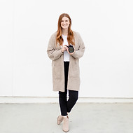 Image of Sacramento Photographer, Courtney Kreutzer, posing with a camera