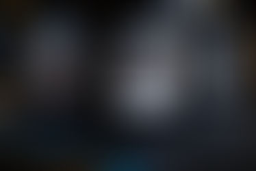 Bottle of Hupnos Sous le Végétal, a natural Muscat wine produced by Vasilis Alexiou, featuring a dark label representing the night harvest.