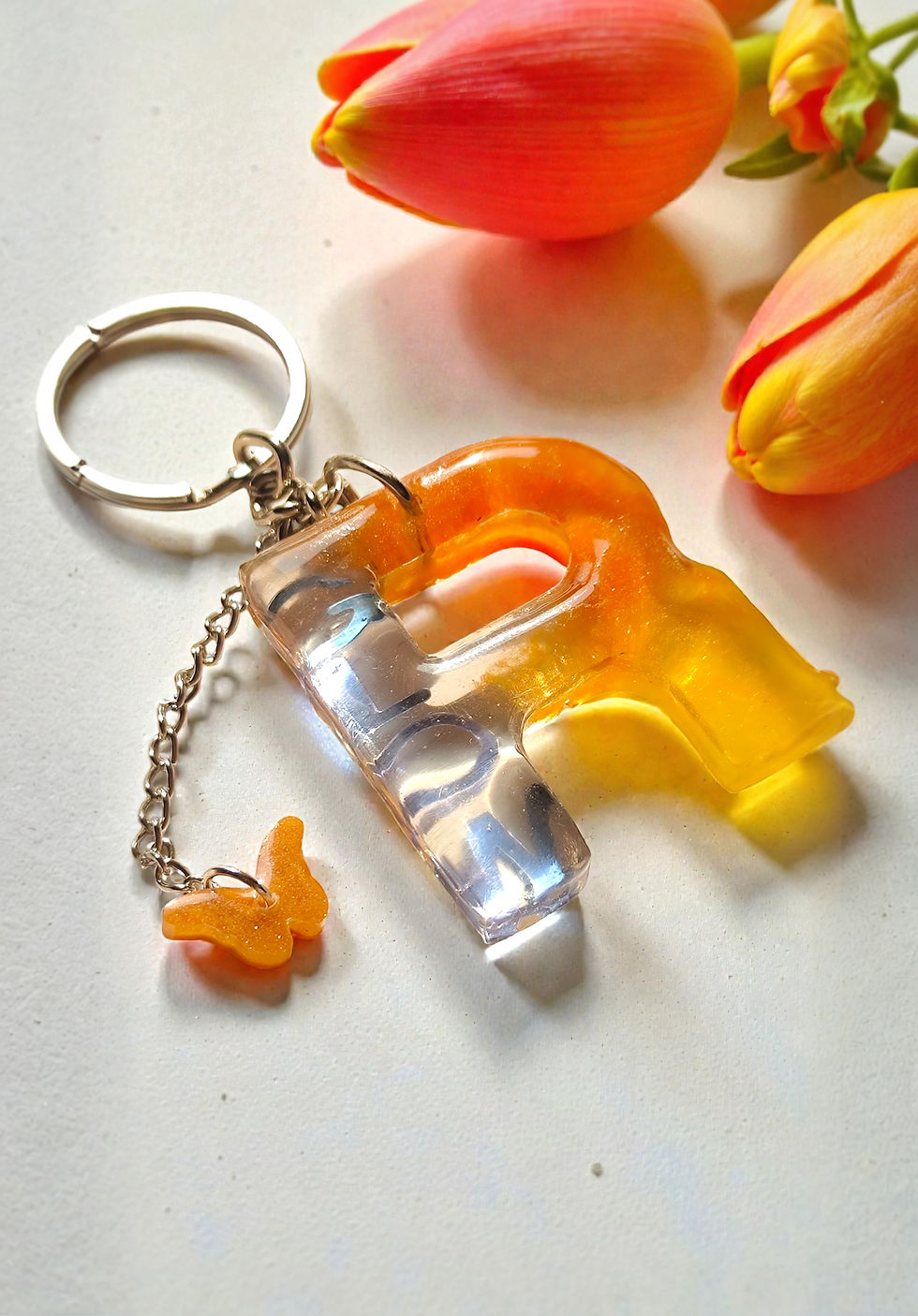 Thumbnail: Personalized R letter resin keychain glowing written design keyring