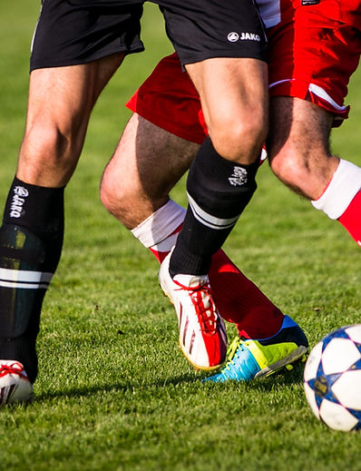 Soccer Players Competing