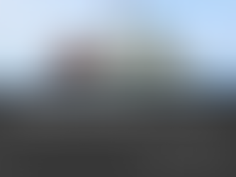 Salvage ship at sea under blue sky. Text: Plundering War Graves: Illegal Salvage Operations in the Pacific. READ NOW in white on gray.