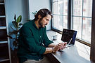 Man banking on two devices