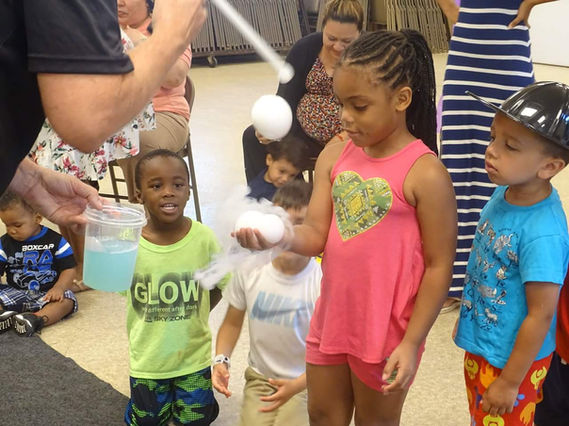 The Parent-Teacher Association event bursts with excitement as an interactive bubble show takes center stage. Children and parents marvel at the dazzling display of giant bubbles, eagerly participating in bubble-making activities and games. Laughter and wonder fill the air as everyone gets immersed in the magical world of bubbles, creating joyful memories to treasure.