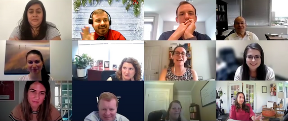 A group of people smiling and engaging in a virtual “Finish the Lyrics” game over Zoom.