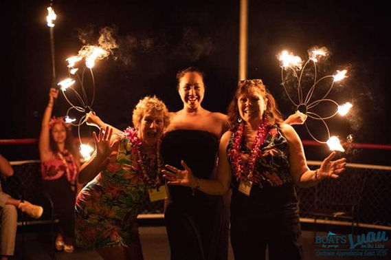 A mesmerizing fire performance by skilled artists, with flames dancing in the night, captivating the audience with daring stunts and elegant choreography. The spectacle adds an exhilarating and unforgettable element to any event, creating an atmosphere of awe and wonder.