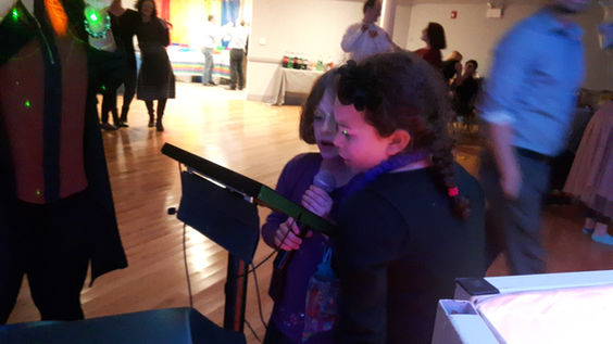 Karaoke DJ operating equipment