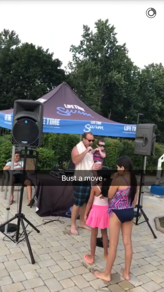 Audience watching a karaoke performance