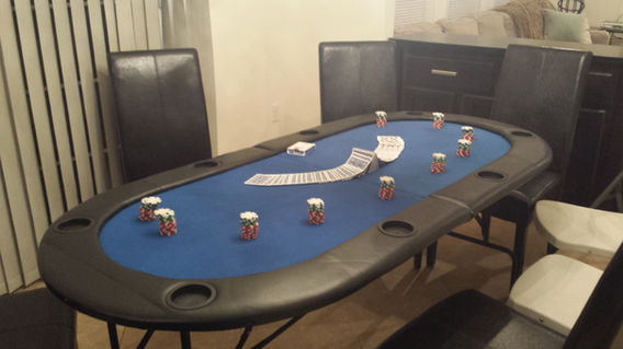 Casino Table For Rent from Magical Memories Entertainment set up with cards and chips for an event