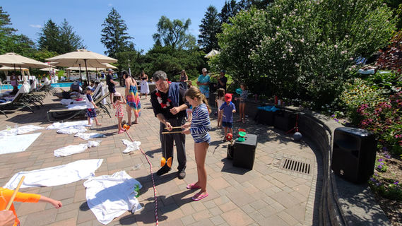 A circus workshop providing dynamic entertainment at the convention event, where attendees can learn various circus skills such as juggling, acrobatics, and clowning, creating a lively and engaging experience for participants.