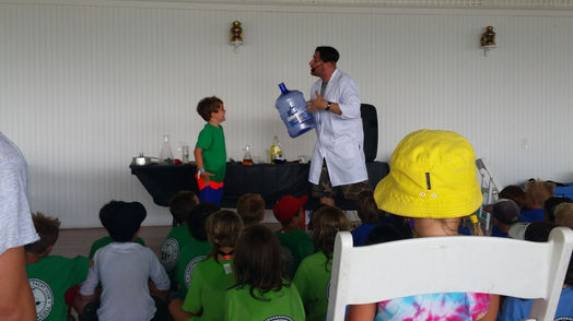 A Science Show Exciting Children with Interactive Experiments and Fun Learning Experiences at a Daycare Center