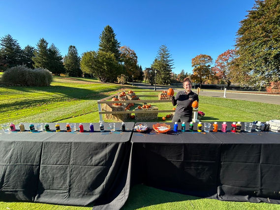 Guests of all ages creating fun crafts at an interactive Arts & Crafts Station, sparking creativity and providing a hands-on experience at any event.