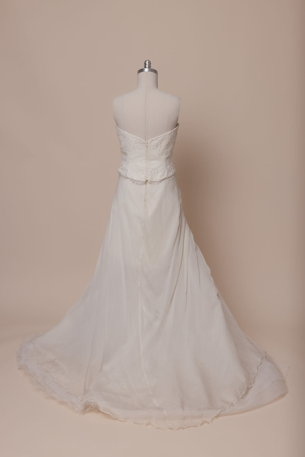 Thumbnail: Two-piece vintage wedding dress with silk lace and beading against an ivory backdrop