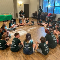 campers sit in a circle on the first day of camp