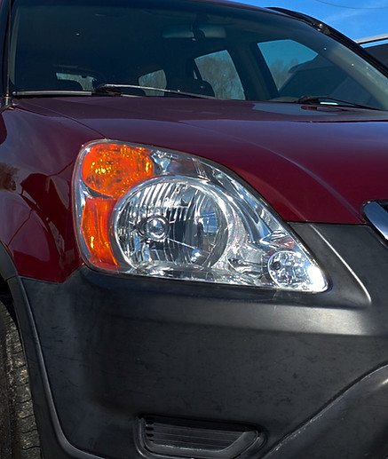 Crystal clear headlight after professional headlight restoration.