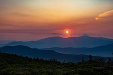 Layers of mountain silhouettes at sunrise from South Twin Mountain.