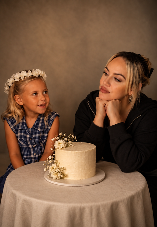 A Warm Portrait with Cake and Flowers.png