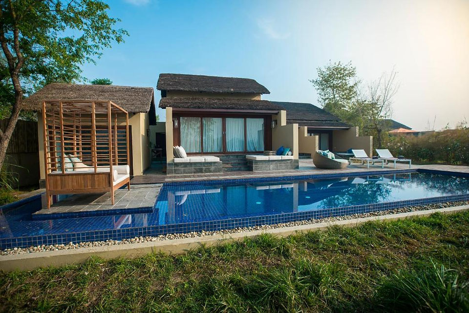 Villa con piscina nel resort nel Parco Nazionale di Chitawan