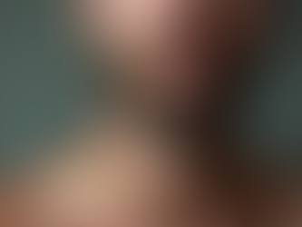 Man with a well-groomed beard applying Crown Care Scalp & Haircare Therapy Oil to soothe sensitive skin.