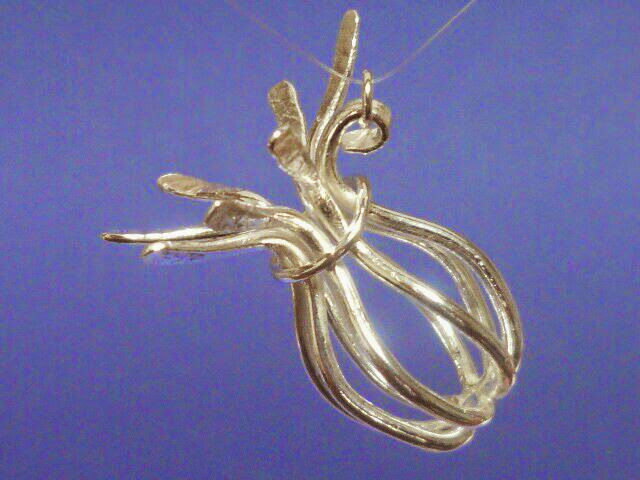 Poppy seed pod pendant