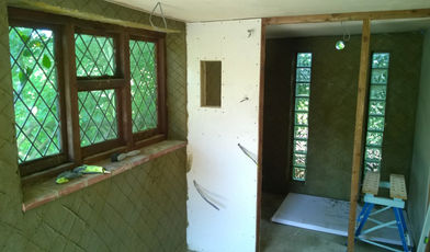 Installing bathroom and plastering walls