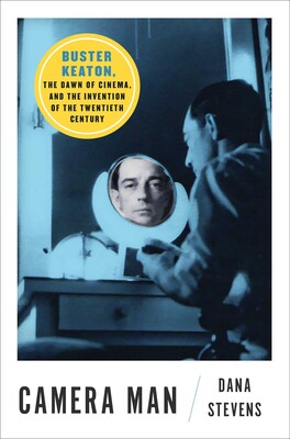 Book cover includes Buster Keaton looking into a mirror at a table and in the reflection we can see Buster's solemn face.