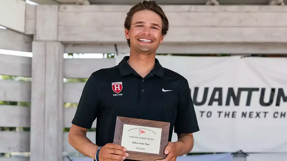 Justin Callahan holding the 2026 College Sailor of the Year Award