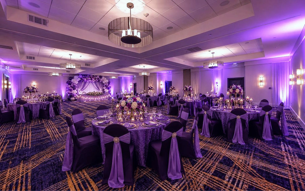 Luxury wedding reception setup with purple decor at Jacksonville event venue