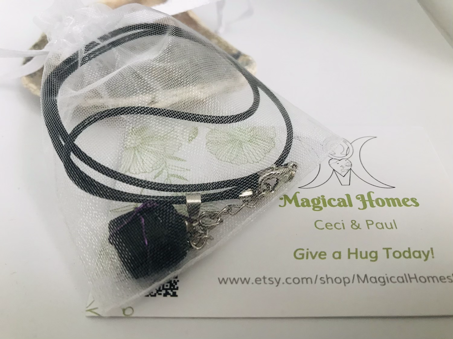 Black tourmaline crystal pendant with copper to enhance EMf protectioncrystal