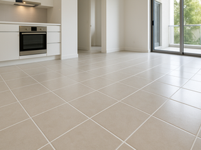 Clean, modern tile floor with sealed grout in a bright residential kitchen and living area — professionally cleaned and well-maintained.