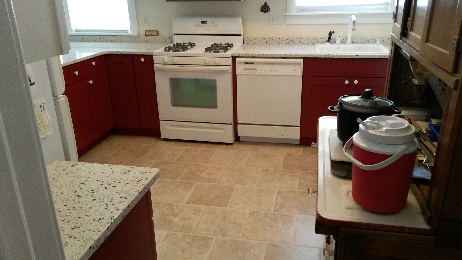 Completed kitchen remodel with new flooring, countertops, cabinets, painting, and drywall repairs in Egg Harbor Township, NJ
