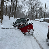 Snow plowing a road