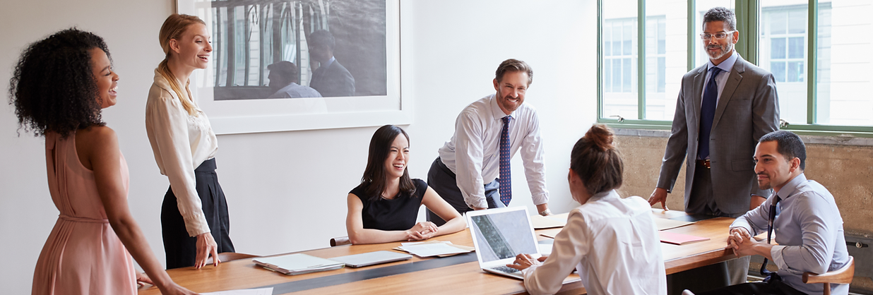 Young professionals around a table at a