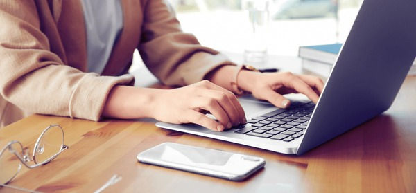 young-woman-working-on-computer-600nw-1711024264.jpg