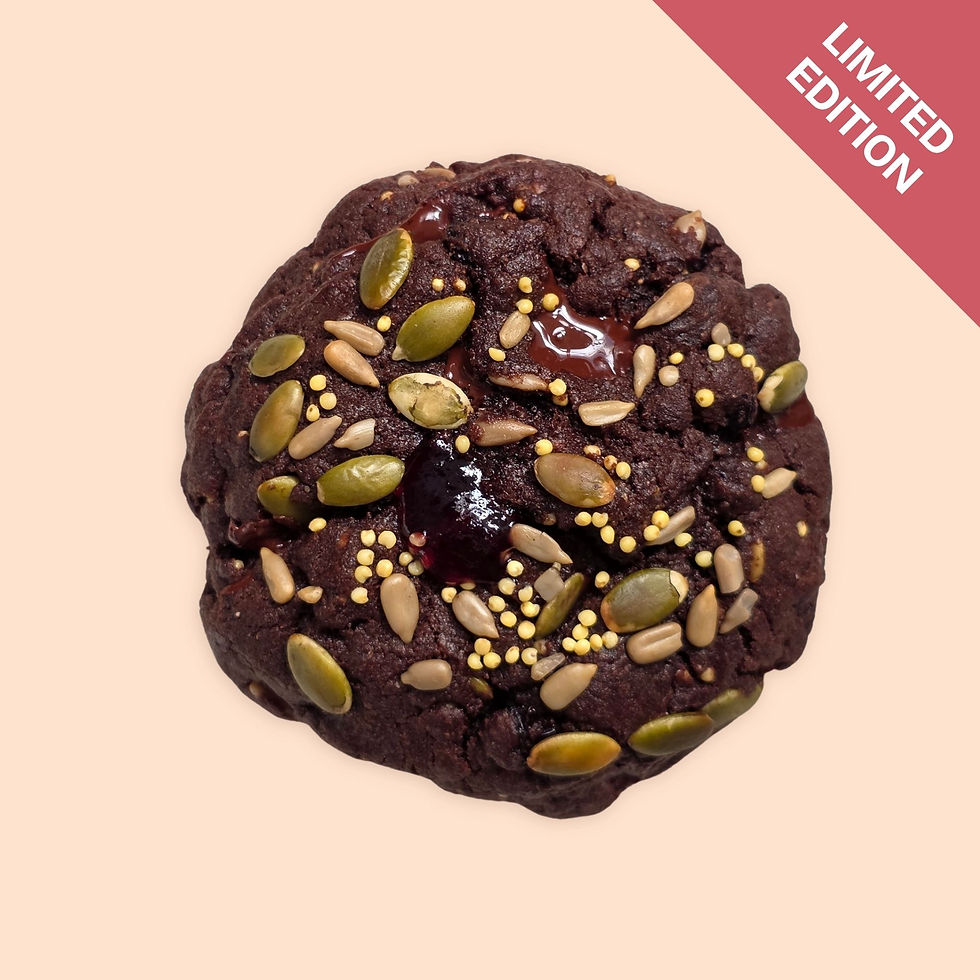 Chocolate cherry and rye cookie on a cream background