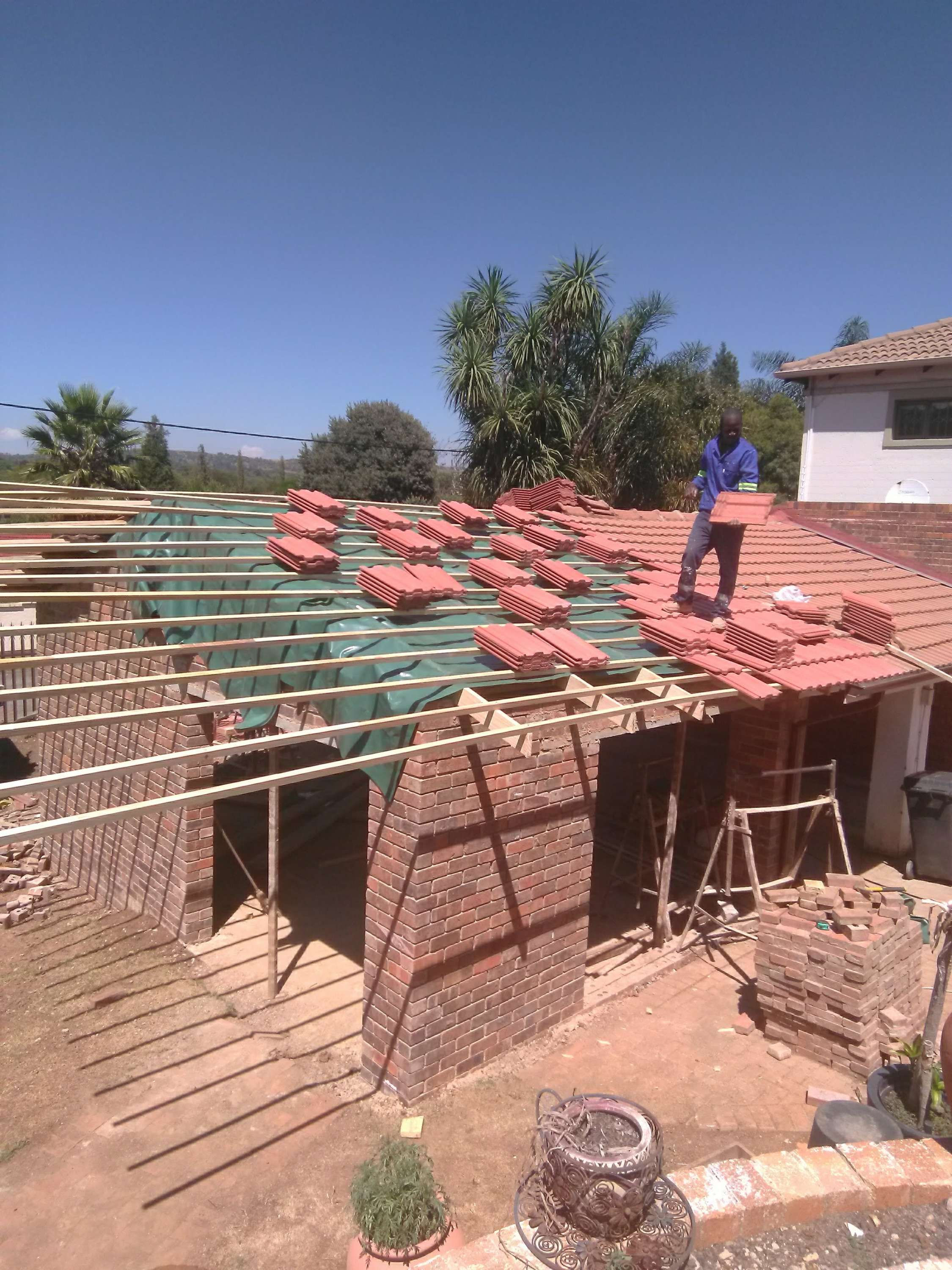 Building and roof installing 