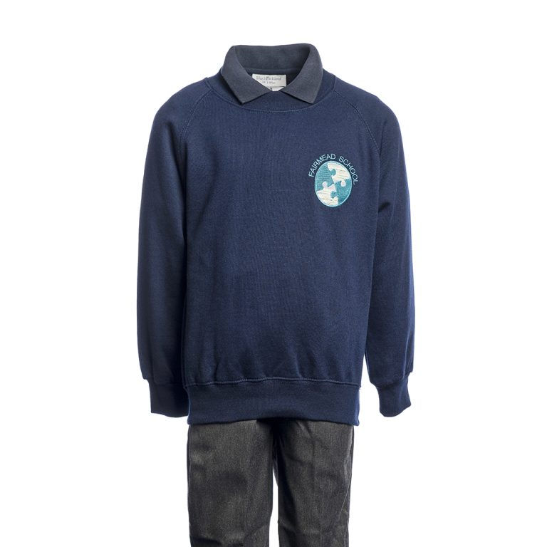 Blue sweater with Fairmead School logo, uniform, and dark trousers FairmeadSchool