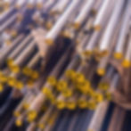 Create a realistic, high-quality image showcasing Alloy and Carbon Steels. Feature real te